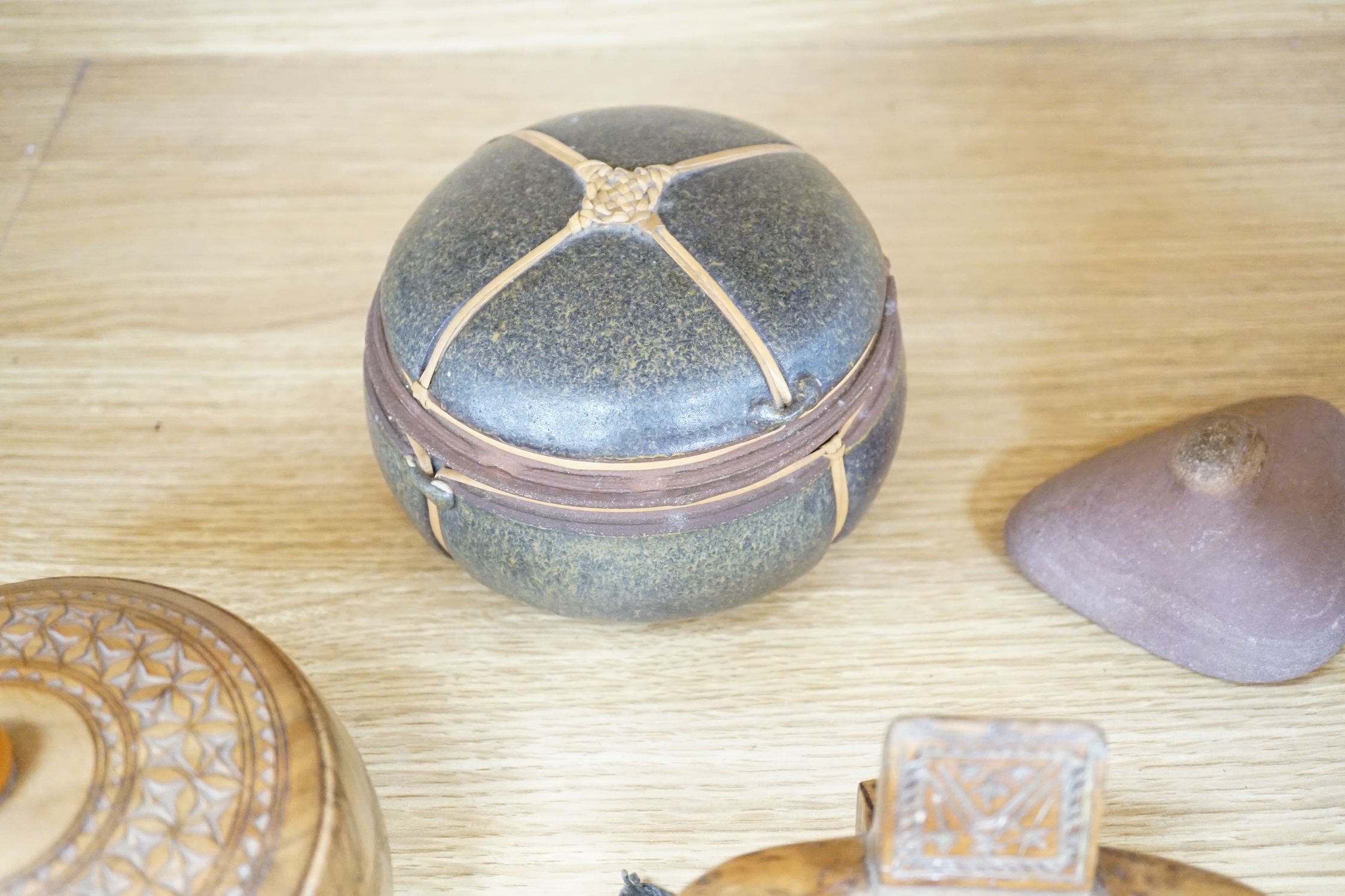 An 18th century oak salt/herb box, a collection of treen boxes, wood block and a pottery box and stone (10), salt box 31cms high